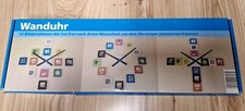 Foto Wanduhr mit 12 bunten Bilderrahmen