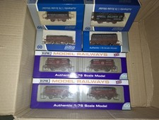 8 NEW boxed Dapol 00 model rail wagons all with loads and factory weathered.