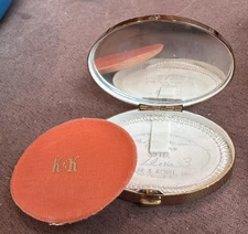 Vintage Golden 1950’s Mirror Compact. Never Used. Oval 2.5 Inches Wide