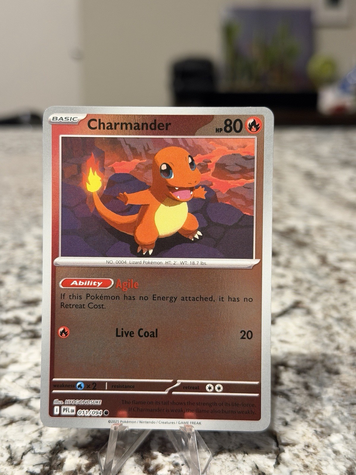 Charmander 011/094 Reverse Holofoil (RH) ME02: Phantasmal Flames (PFL) - NM/LP