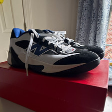 Imagen de New Balance Men's Low Top Lace-Up Athletic Sneakers Black White Blue