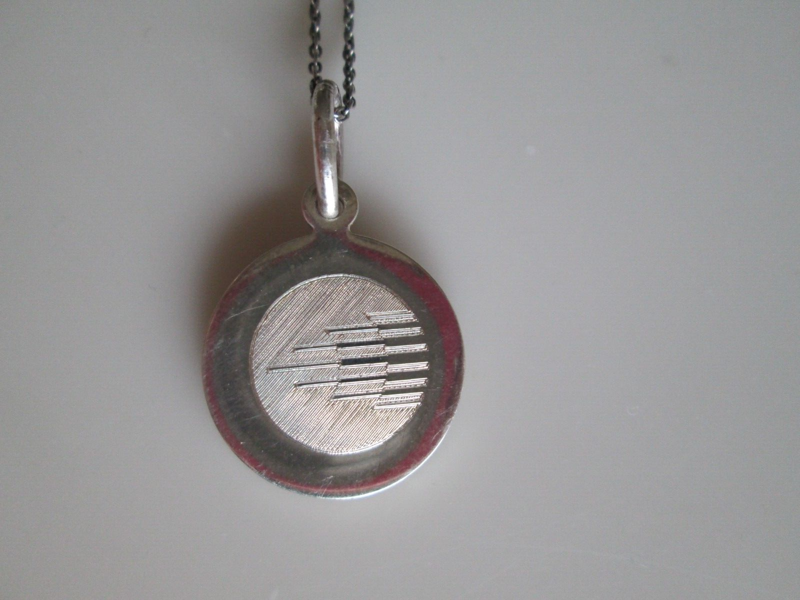 TIFFANY & CO. STERLING SILVER PENDANT ON 18 INCH CHAIN