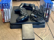 Sony PlayStation 4 Slim 500GB Console - 2 Controllers, 1 TB Seagate HD, Games