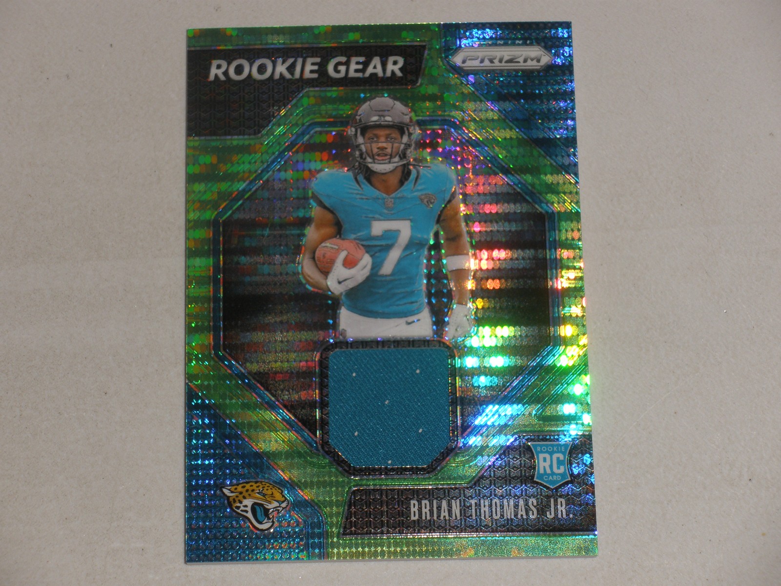 2024 Panini Prizm Rookie Gear Neon Green Pulsar Prizm Jersey Brian Thomas Jr RC
