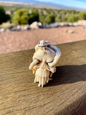Fossil Netsuke - Skull with Snake Carving, Intricate carving