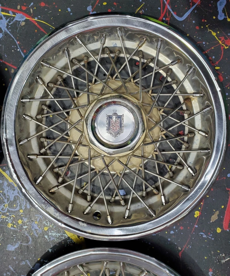 "Juego de cuatro tapacubos Chevrolet Monte Carlo 1976 radios de cable Norris Industries 14"""  Foto 3 de 4