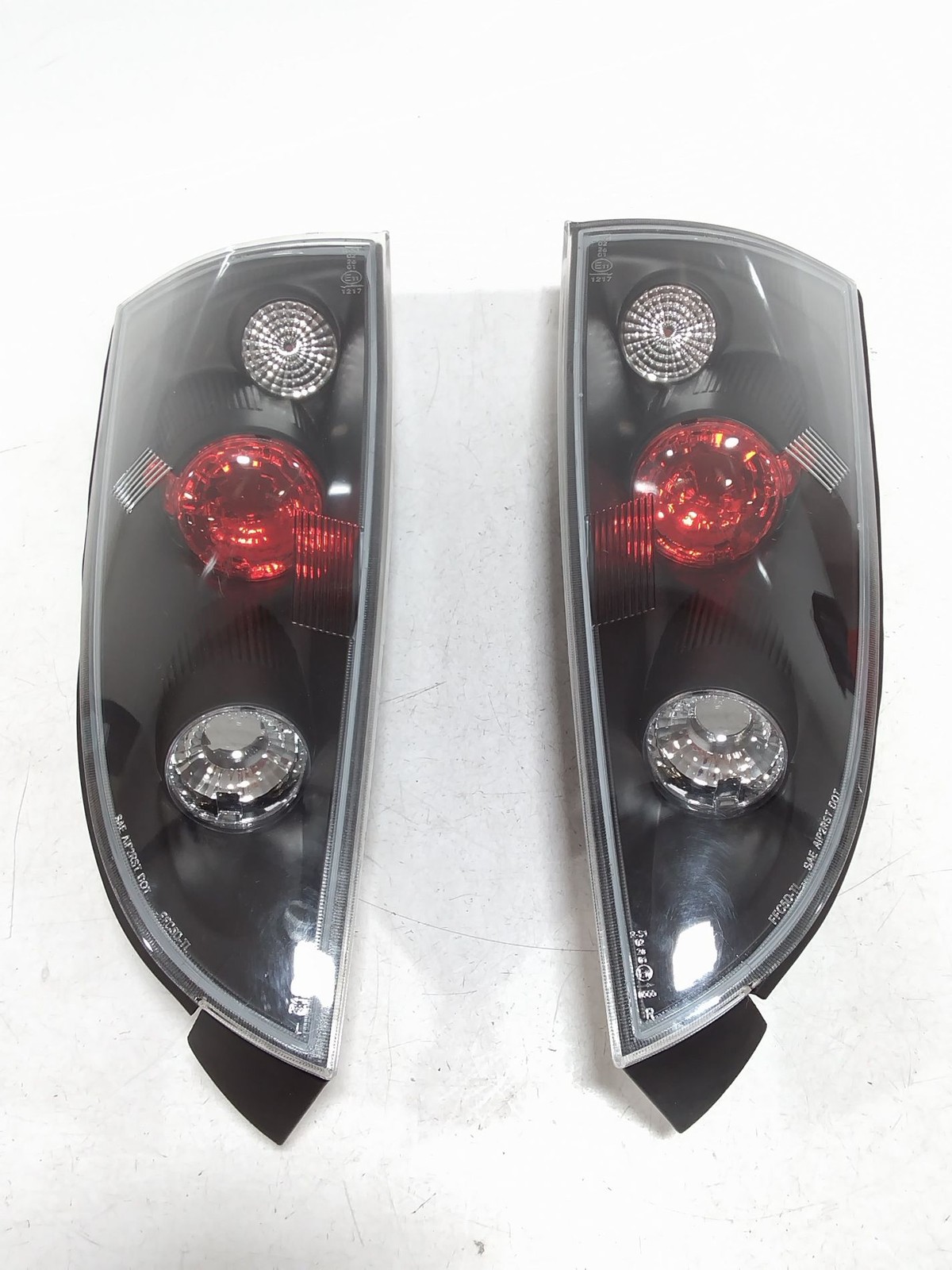 Feu arrière Ford Focus I finition d'origine 1214226 plastique premium