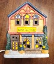 Lite Up Ceramic House General Store with original box.
