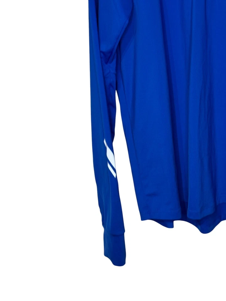 Prendas para el torso Under Armour para hombre 1/4 cremallera agujeros para el pulgar equipo de rendimiento regular azul mediano Foto 3 de 4