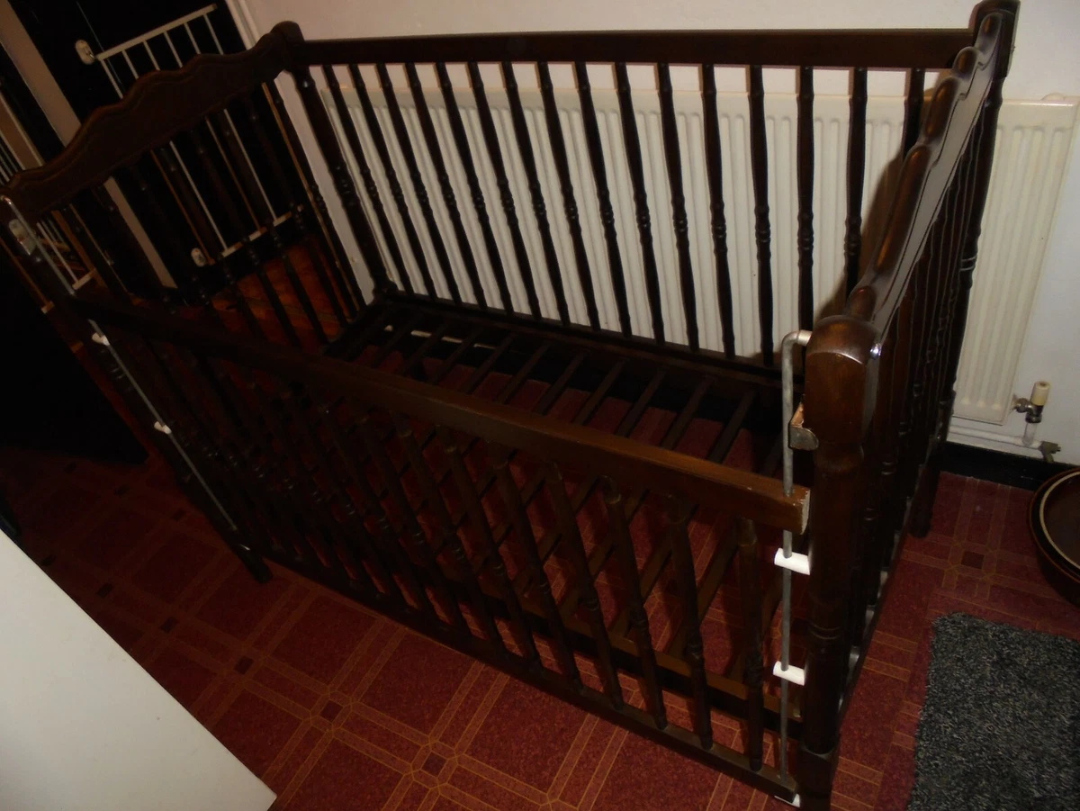 VINTAGE DROP FRONT WOODEN COT