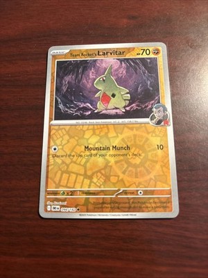 Team Rocket's Larvitar 094/182 Sv10: Destined Rivals Reverse Holo