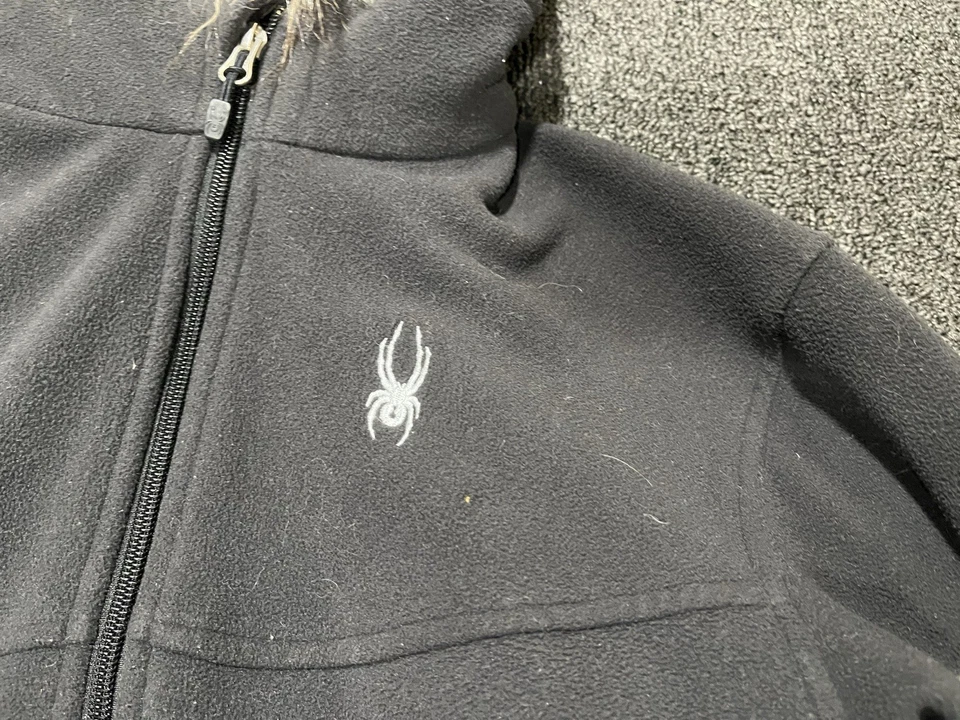 Chaqueta con capucha Spyder para mujer talla grande de piel sintética cremallera completa negra polar Foto 2 de 4