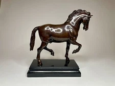 After Giambologna and Susini, a patinated bronze pacing horse