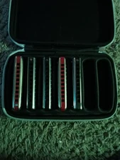 harmonica case with five harmonicas