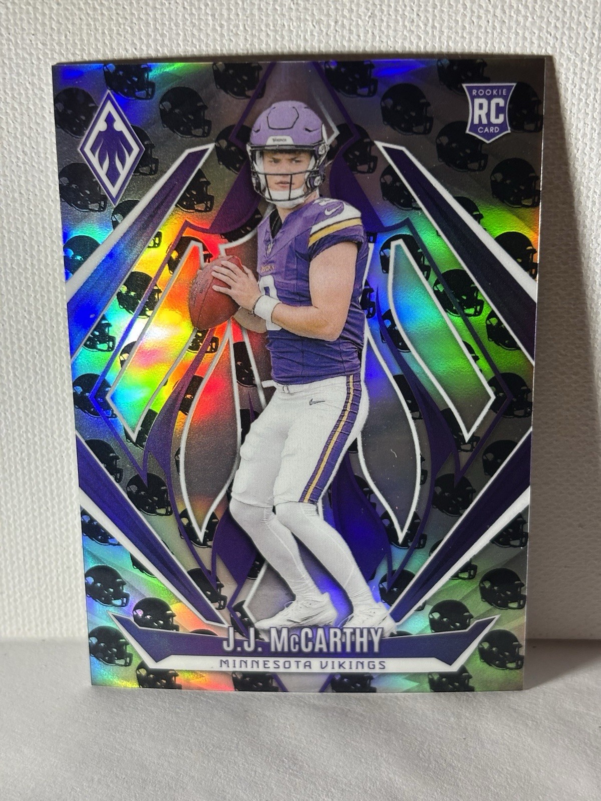 2024 Panini Phoenix - Rookies J.J. McCarthy #185 Team Helmet /399 (RC)