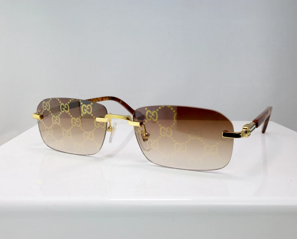 Gafas de sol Gucci GG1221S 004 56 mm cuadradas sin montura doradas con lente con logotipo marrón Foto 2 de 4