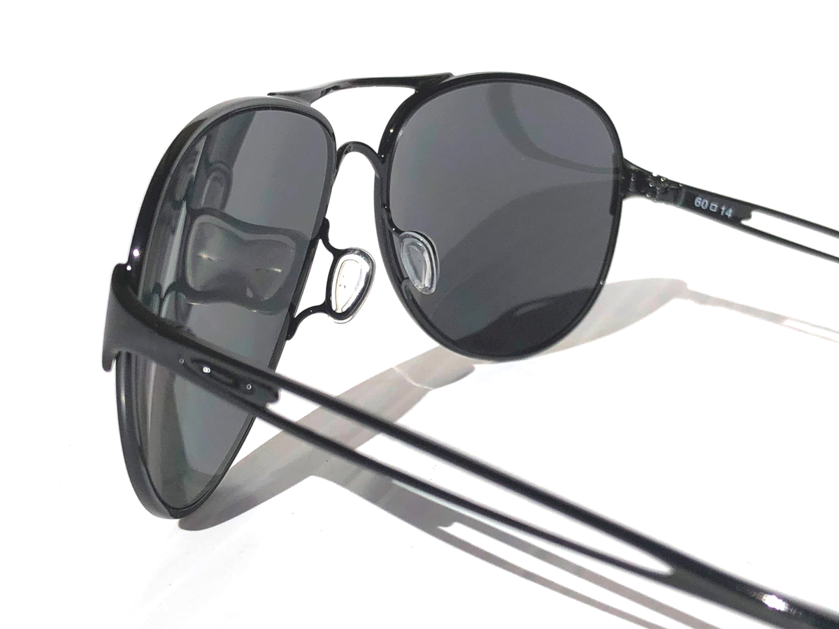 Oakley CAVEAT Shiny Black POLARIZED Black Silver Mirror Sunglass