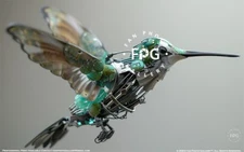 Mechanical Hummingbird Photo Desktop Wallpaper Large 1920x1200 pixel JPEG File