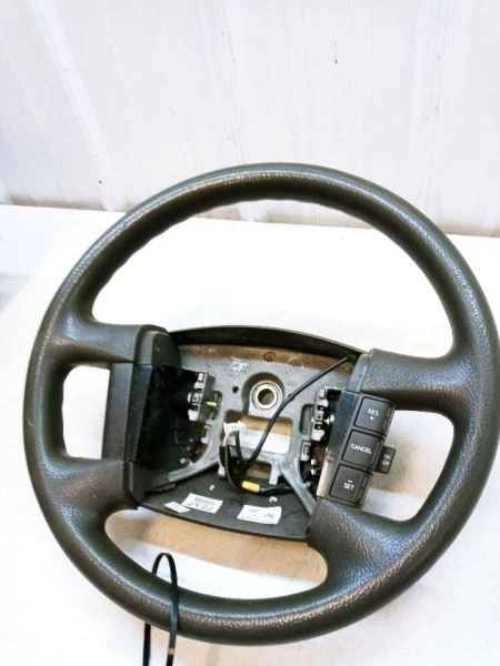 Volante KIA BORREGO 2009 2010 2011 CUERO NEGRO CON INTERRUPTORES OEM Foto 2 de 4