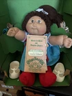 1984 Cabbage Patch Kid female doll w/brown eyes and brown hair Signed in green
