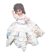 Vintage doll in crochet dress redish Brown hair blue eyes Please Read Discript