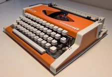 Olympia Traveller de Luxe Typewriter Orange Spain Great Condition Refurbished