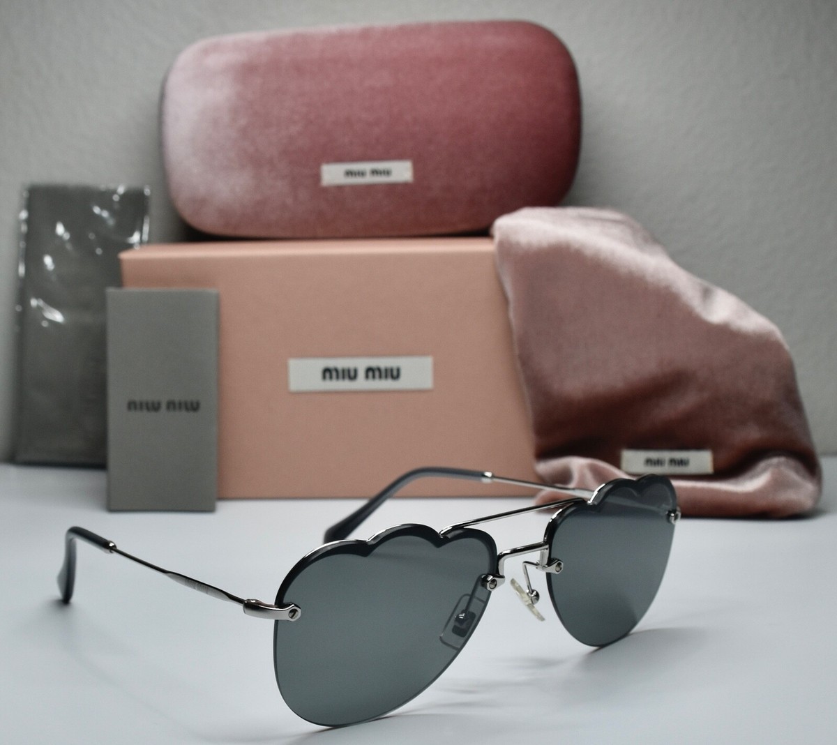 MIU MIU SMU56U 1BC-175 SILVER DARK GREY GEOMETRIC AVIATOR SUNGLASSES. 58mm MIU MIU SMU56U 1BC-175 SILVER DARK GREY GEOMETRIC AVIATOR  main image 4