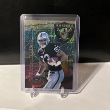 1996 Playoff Illusions Rickey Dudley #24 Spectralusion Dominion (RC)