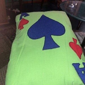 15 X 10 Green Cotton Covered Pillow With The Large Spade In The Middle