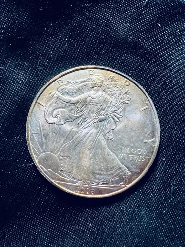 2008 American Eagle lightly toned Uncirculated 1 oz .999 Silver Bullion $1 Coin