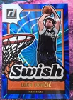 Luka Doncic 2024-25 Panini Donruss Swish Holo Blue Laser 31/49 #10