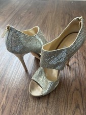 Jimmy Choo champagne glitter fabric sandals.
