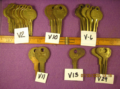 23 PC NOS V2, V10, V6, V29, V13, V11, UNCUT KEY BLANKS BRASS PLATE OVER STEEL.
