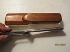 Brown vintage Playtex hair cutter with black handle in clear case, resting on white surface, text “07/11/2018” at bottom.