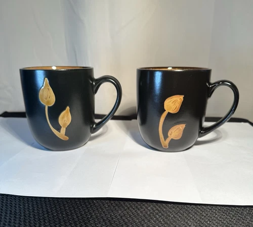 Vintage Pair Of Black And Tan Stoneware Coffee Mugs