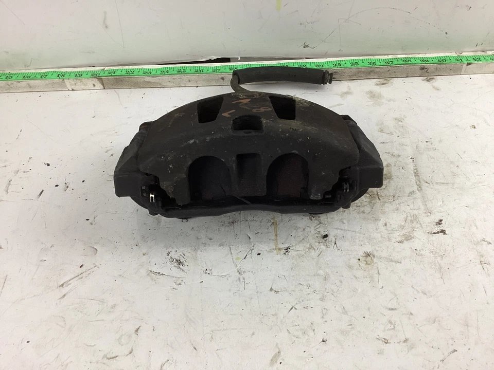 Pinza de freno delantera izquierda del lado del conductor Dodge Grand Caravan 2013-2018 OEM Foto 3 de 4