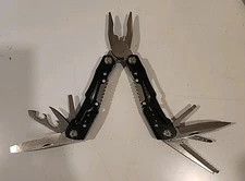 Multi Tool Spring Loaded Pliers With Cutter Plus 8 Blade Black