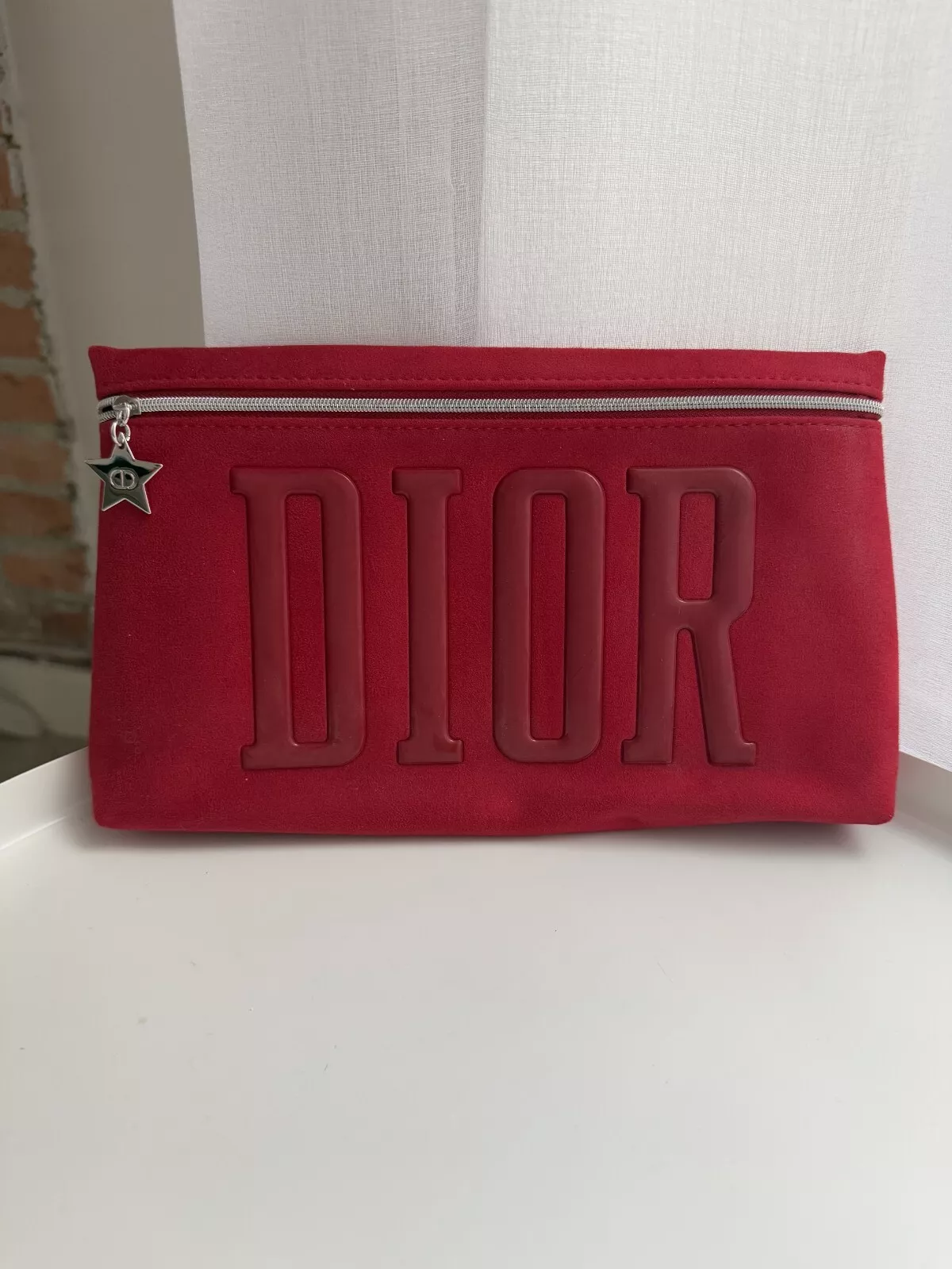 Grande trousse rouge effet peau de pêche Dior Neuve