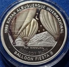 A 1993 ALBUQUERQUE INTERNATIONAL BALLOON FIESTA .999 SILVER COIN BOX COA
