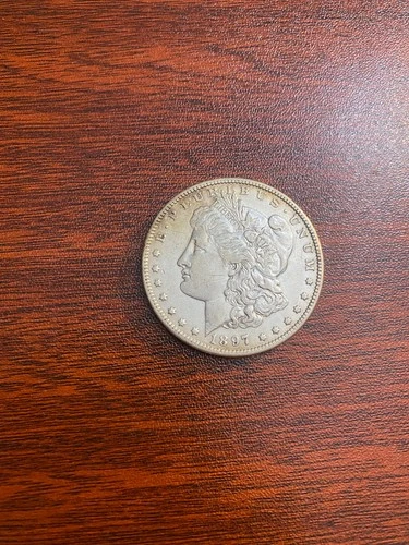 1897-O Morgan $1 – Tough Date AU Cleaned – Semi-Key New Orleans Issue