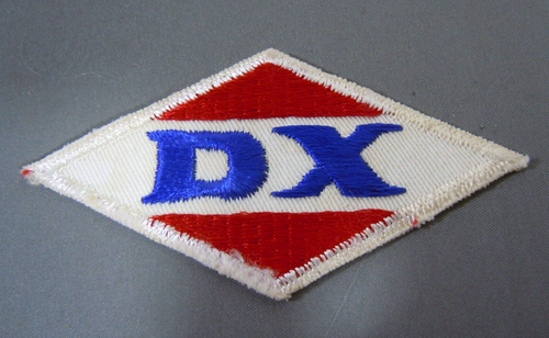 "Vintage ""DX"" gasbestickt Aufnähen Uniform-Jacke Patch 4""x2" - Bild 1 von 2