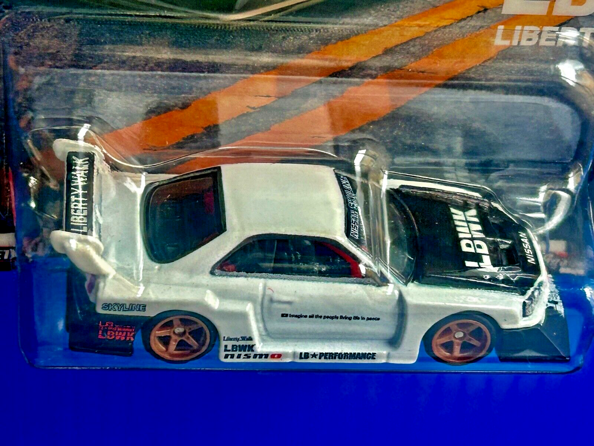 Hotwheels LBWK Nissan Skyline ER34 サイン入り s-l400.jpg