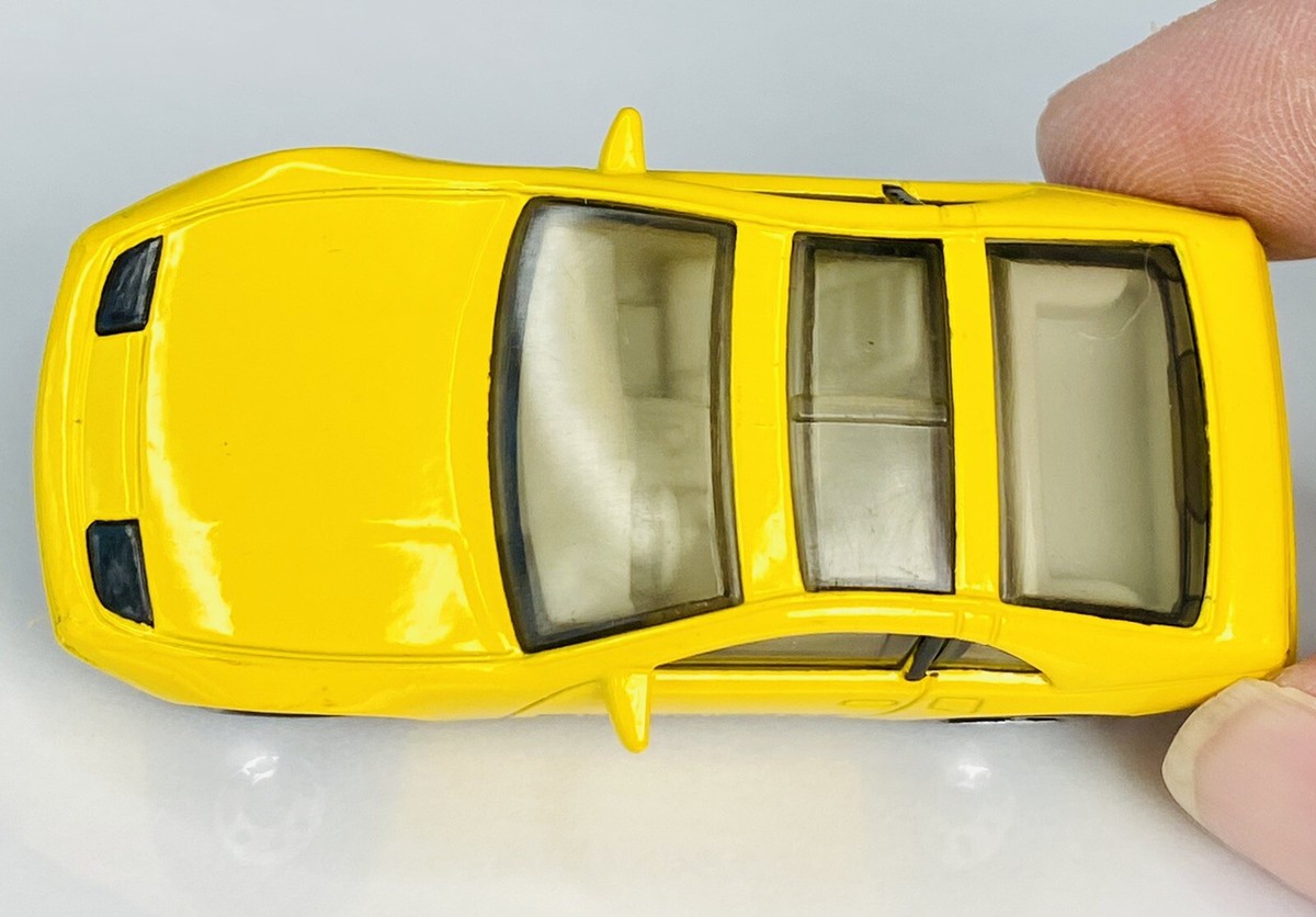 1990 Matchbox - Nissan 300ZX (Yellow w/ Outline Black Tampo