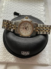 Men’s size Tag Heuer 1500 two tone just been serviced big bracelet. Quartz. 