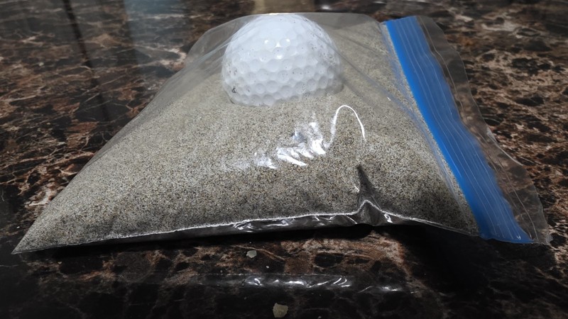 Golfers' bunker in a bag gag gift with Oregon Coast sand & a golf ball