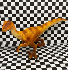 JMW Sales 2016 Toys R Us Soft Body Orange Velociraptor Dinsouar 10x4.25