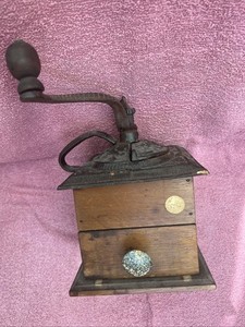 vintage cast iron and wood coffee grinder