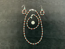 Kingman Turquoise with top grade natural red coral and sterling silver. 4 piece