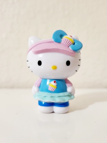 Sanrio Miniatur Hello Kitty Mini Figur Spielzeug 2" groß Cupcake Kleid mit Schleife