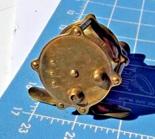 Antique Brass Fishing Reel #40 on foot Raised Pillars ( Hendryx ?)